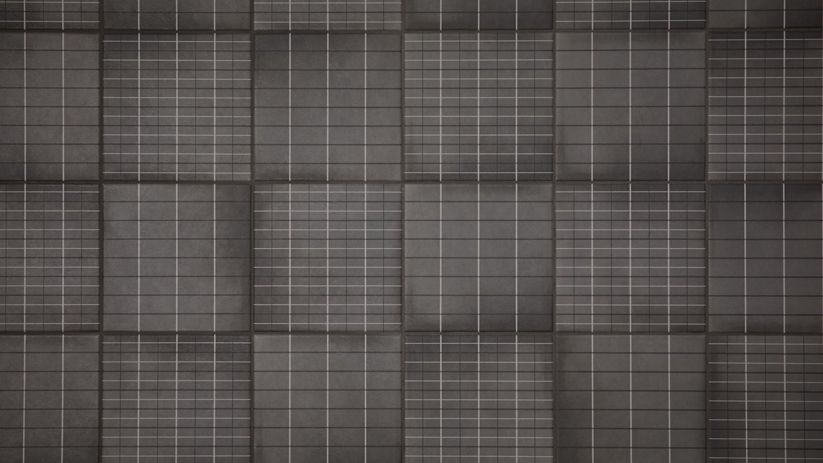 Kylpyhuoneen seinae Aurore Charcoal Grid L laatoista Mutina