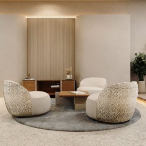 Pyöreä Ginza-pöytä ja kolme nojatuolia epämuodollisessa nurkassa