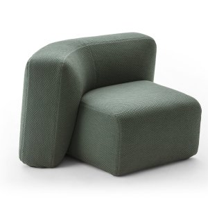 Nojatuoli Suiseki sohvapöydän vieressä loungessa